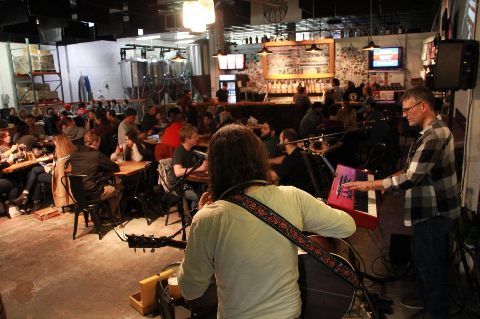 Musicians performing in the taproom